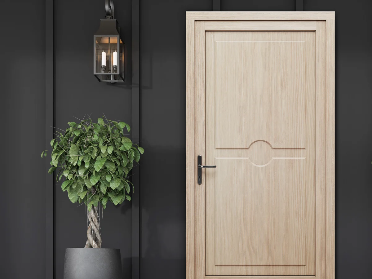 Porte d'entrée bois clair à panneau fraisé devant un mur noir